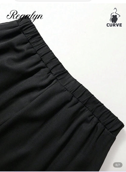 Women’s Black Asymmetrical Pleated Midi Skirt – Elegant High Waist Flowy Skirt