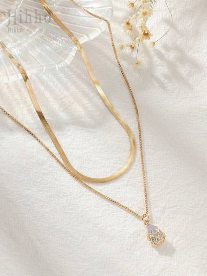 Women Layered Gold Necklace – Snake Chain & Crystal Drop Pendant