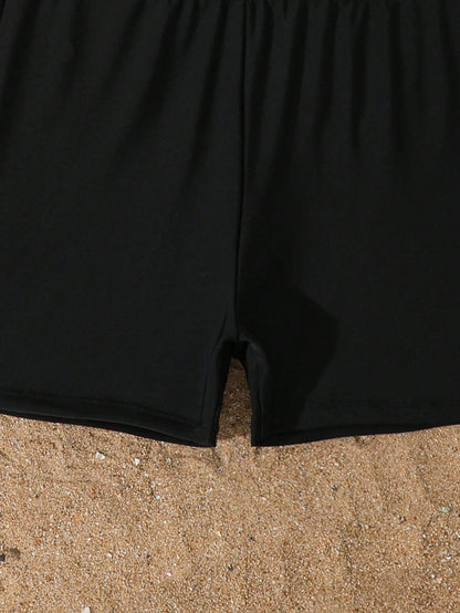 Girls Black Skirted Swimsuit Set, Strappy Swim Dress with Matching Shorts and White Side Details