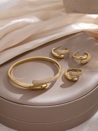4 Piece Gold Tone Crystal Accent Jewelry Set – Bangle Bracelet Hoop Earrings and Ring – Elegant Women Accessories