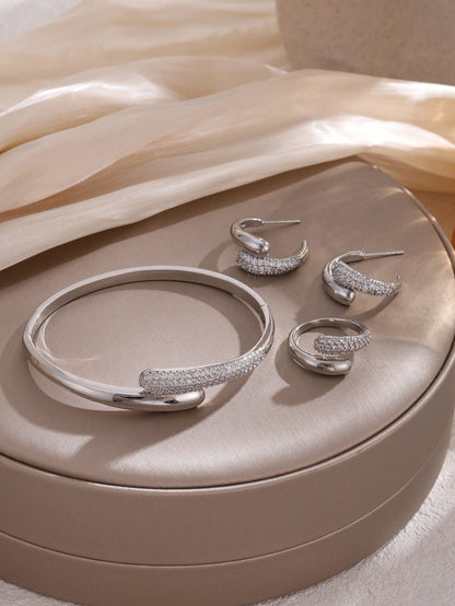 4 Piece Gold Tone Crystal Accent Jewelry Set – Bangle Bracelet Hoop Earrings and Ring – Elegant Women Accessories