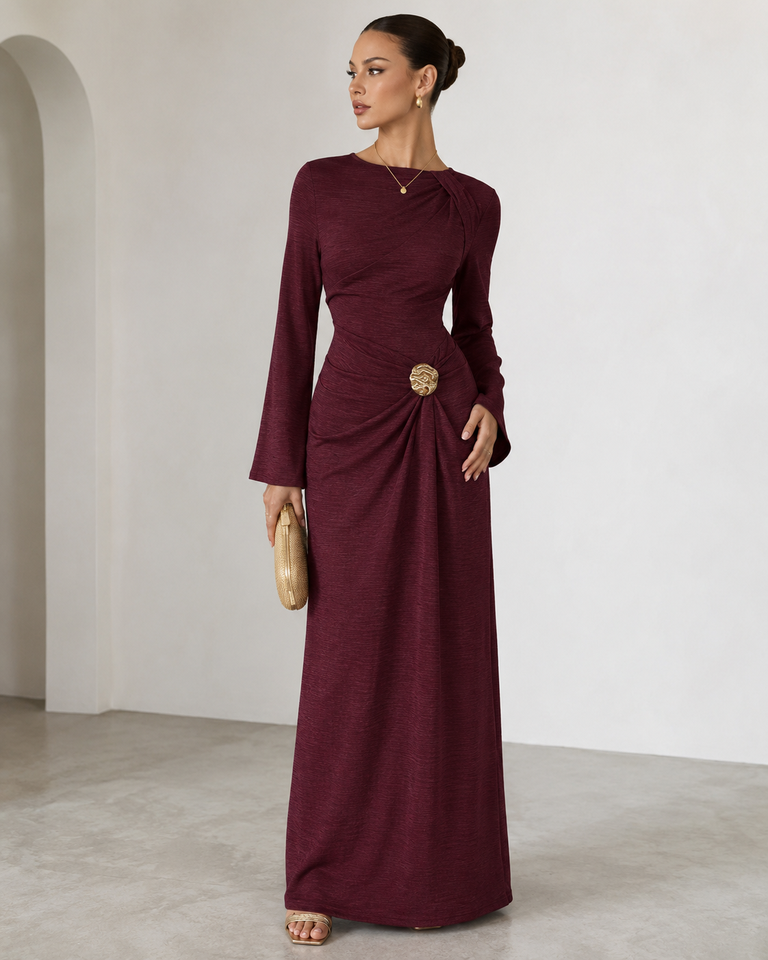 Elegant Burgundy Maxi Dress with Gold Brooch Detail