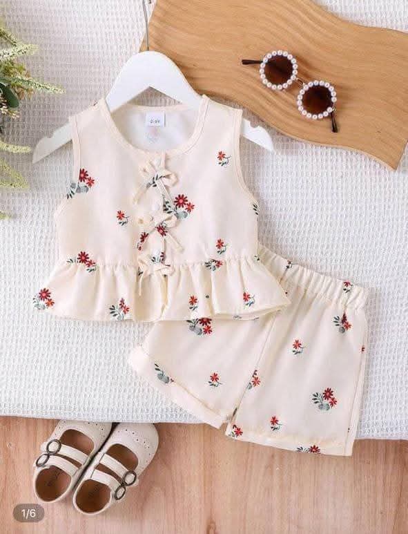 Girls Cream Floral Sleeveless Top and Shorts Set with Ruffle Hem and Bow Details